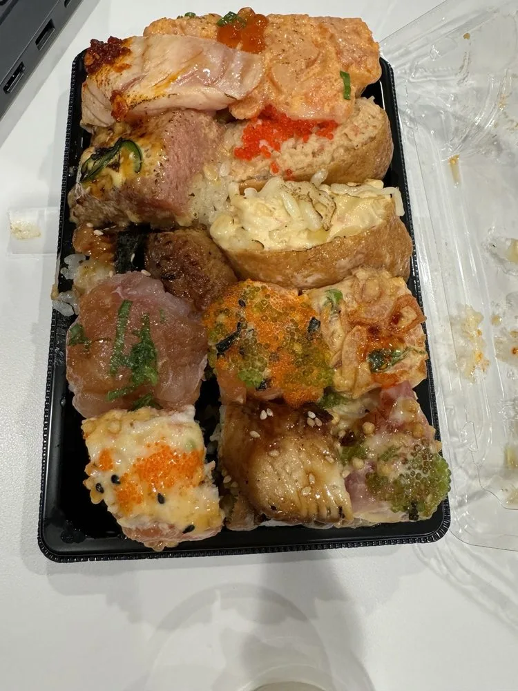 3 sushi bombs, unagi nigiri, seared salmon nigiri and assorted rolls